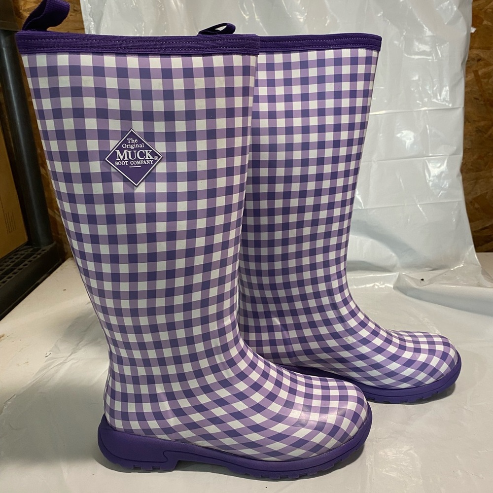 Tall Muck Boots.